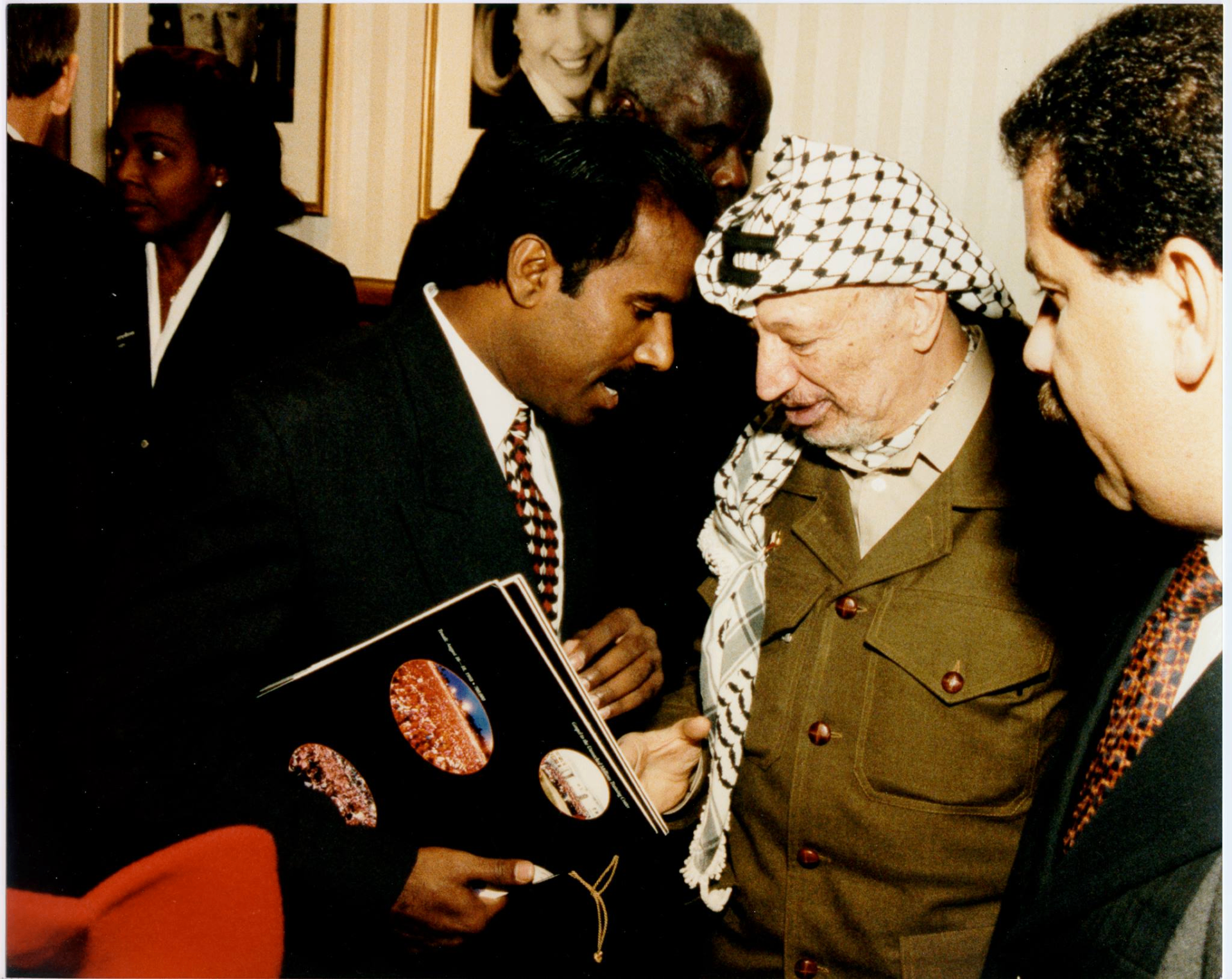 Dr. K.A. Paul presenting a book to Palestinian leader Yasser Arafat